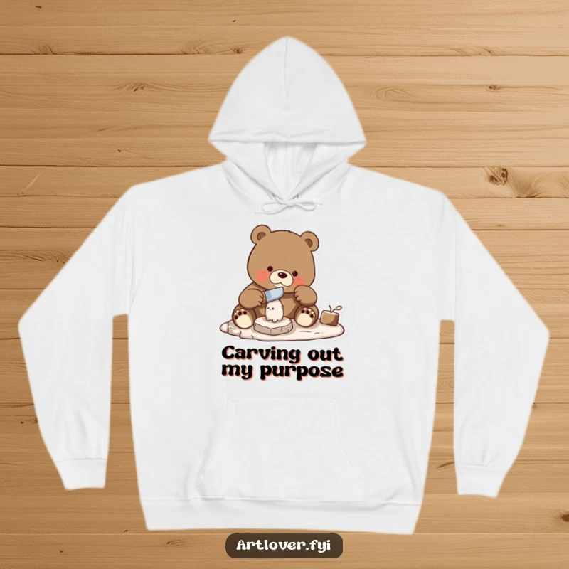Funny bear expertly using a chisel to carve a small statue, depicted on a cozy artisan hoodie.