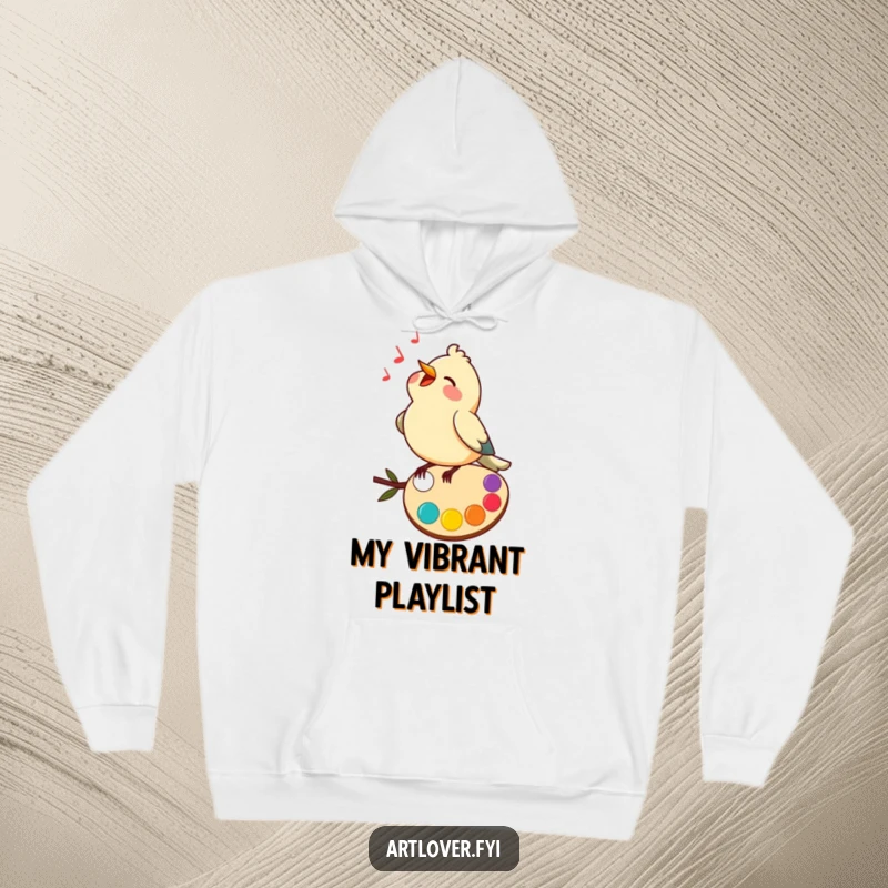 Funny hoodie featuring a bird happily singing atop a colorful artist’s palette, bringing cheerful musical art.