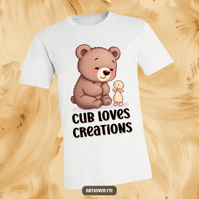 Funny Bear Cub Artist T-Shirt: A playful bear cub appreciating a small abstract clay figure, humorously designed for gift-givers.