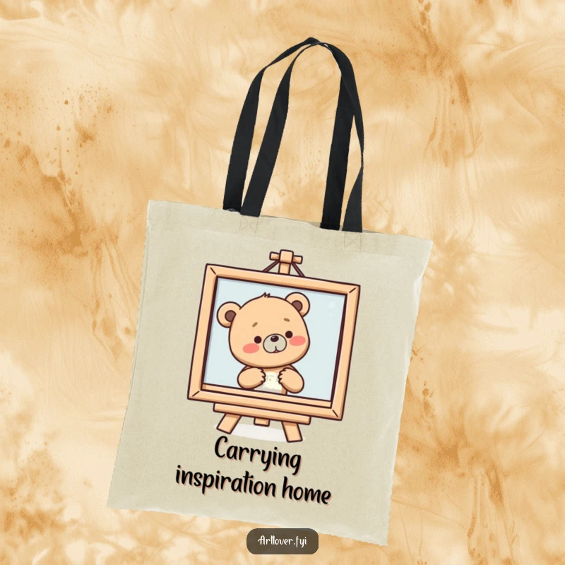 Funny Bear Cub Art Tote Bag showing a smiling cub sighing at a painting, perfect for carrying art supplies.