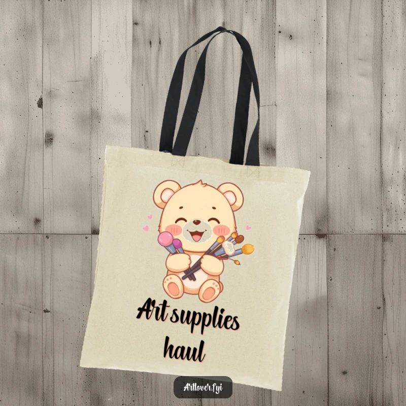 Funny tote bag with a joyful bear cub holding a bouquet of paint brushes, embodying a love for art.